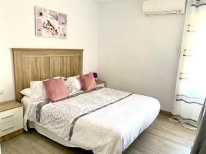 Postel nebo postele na pokoji v ubytování Iris Vistas Benalmadena