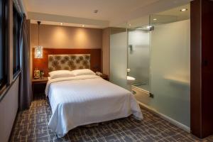 Katil atau katil-katil dalam bilik di Rich & Free Hotel - Kaifeng 富逸旅趣-北車開封館