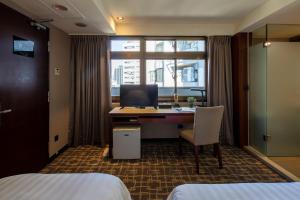 Televisyen dan/atau pusat hiburan di Rich & Free Hotel - Kaifeng 富逸旅趣-北車開封館