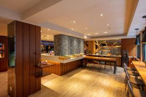 Televisyen dan/atau pusat hiburan di Rich & Free Hotel - Kaifeng 富逸旅趣-北車開封館