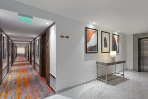 a hallway in a building with a hallway at Southern Star,Bangalore in Bangalore