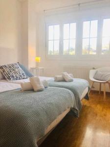 A bed or beds in a room at Avenida Apartamento