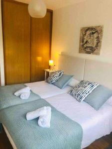 A bed or beds in a room at Avenida Apartamento