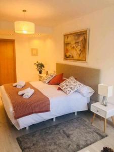 A bed or beds in a room at Avenida Apartamento