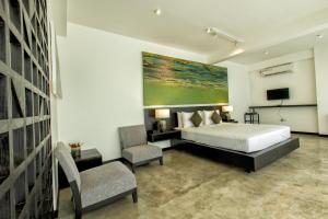 Postel nebo postele na pokoji v ubytování Splendour Residence + 37 fotografií