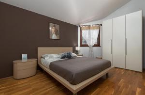 Posteľ alebo postele v izbe v ubytovaní Biba Lux