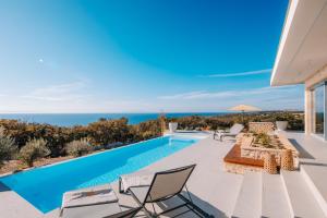a villa with a swimming pool with a view at Luxury villas on Island Pag - Plant Villas Novalja in Novalja