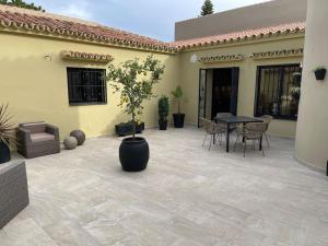 Patio lub wspólna przestrzeń na świeżym powietrzu w obiekcie El Sentimiento Don Javier Apartment