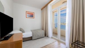 TV a/nebo společenská místnost v ubytování Hotel Splendid