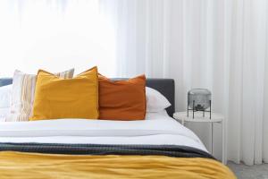 Łóżko lub łóżka w pokoju w obiekcie Modita Boutique Apartments