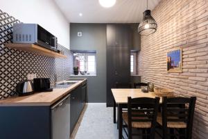 Kuchnia lub aneks kuchenny w obiekcie Modita Boutique Apartments