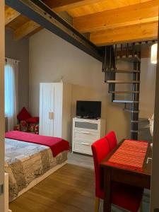 Postel nebo postele na pokoji v ubytování B&B Cascina Sagrestia