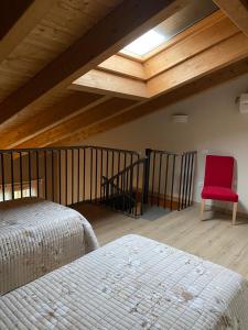 Postel nebo postele na pokoji v ubytování B&B Cascina Sagrestia