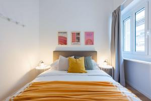 Łóżko lub łóżka w pokoju w obiekcie Modita Boutique Apartments