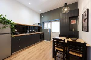 Kuchnia lub aneks kuchenny w obiekcie Modita Boutique Apartments