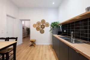 Kuchnia lub aneks kuchenny w obiekcie Modita Boutique Apartments