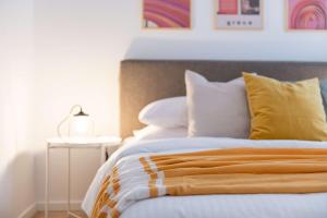 Łóżko lub łóżka w pokoju w obiekcie Modita Boutique Apartments