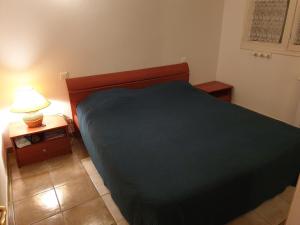 Postel nebo postele na pokoji v ubytování Villa Athena + 21 fotografií