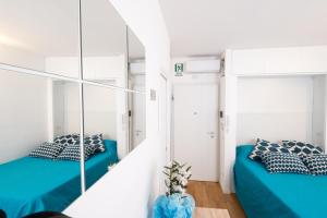 Posteľ alebo postele v izbe v ubytovaní RomAntic Tiny House Aventino