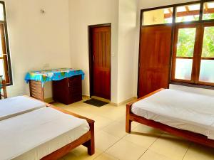 Llit o llits en una habitació de Surf Range