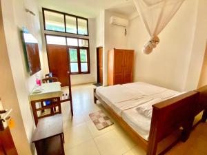 Llit o llits en una habitació de Surf Range