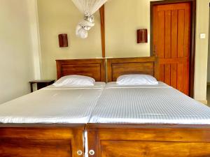 Llit o llits en una habitació de Surf Range