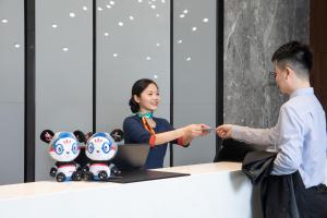 Ospiti di Hampton By Hilton Shenzhen Futian Mangrove Park Apartments