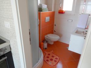 Ein Badezimmer in der Unterkunft Apartments Linda