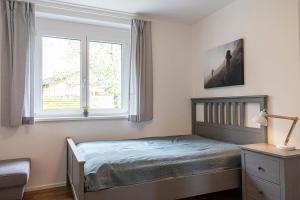 Postel nebo postele na pokoji v ubytování Almblume