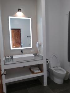 Kylpyhuone majoituspaikassa Bathala Resort