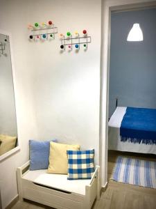 A bed or beds in a room at Cozy house with backyard at Iraklio Attikis