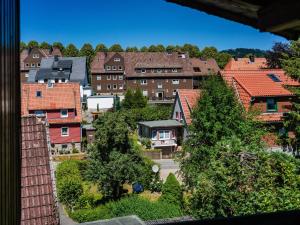 a view of a city with houses and trees at Zimmer Nr 2 im Haus Sabine in Braunlage
