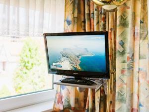 TV/Unterhaltungsangebot in der Unterkunft Haus Sabine - Zimmer 2