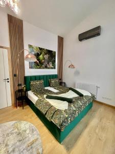 Posteľ alebo postele v izbe v ubytovaní Centropolitan Penthouse #jacuzzi #freeparking