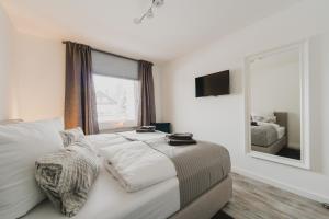 Postel nebo postele na pokoji v ubytování Harzer Auszeit + 13 fotografií