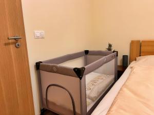 Posteľ alebo postele v izbe v ubytovaní Apartmány Friends Tatry