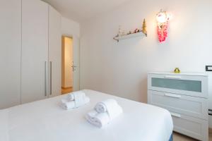 Posteľ alebo postele v izbe v ubytovaní [Luxury apartment near Bocconi] Zamenhof 7