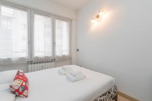 Posteľ alebo postele v izbe v ubytovaní [Luxury apartment near Bocconi] Zamenhof 7