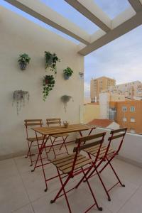 Balkón nebo terasa v ubytování OASIS Malaga City Apartment