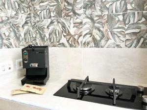 Kuchyňa alebo kuchynka v ubytovaní MASOTTO APARTMENT LINATE-Close Center