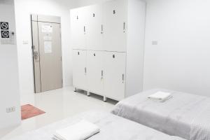 Postel nebo postele na pokoji v ubytování Munruk Hostel