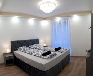 Posteľ alebo postele v izbe v ubytovaní Dream Apartman 2 with Free Parking