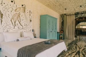 Letto o letti in una camera di Calilo