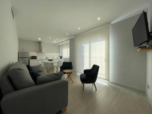 Телевизор и/или развлекательный центр в Apartaments Voramar Roses