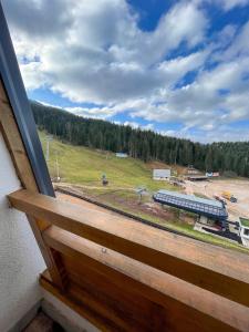 a view from a window of a train yard at Ravna Planina in Pale