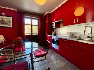 A cozinha ou kitchenette de City Apartments by Malmedreams