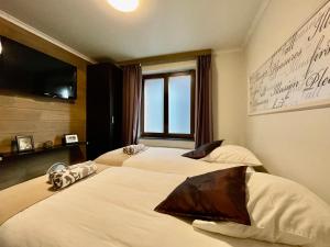Uma cama ou camas num quarto em City Apartments by Malmedreams