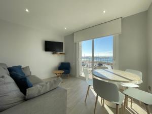 Гостиная зона в Apartaments Voramar Roses