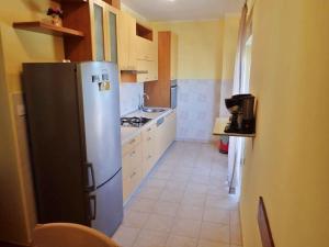 Kuchyň nebo kuchyňský kout v ubytování Apartment in Posedarje 37105