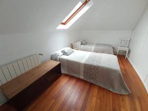 Postel nebo postele na pokoji v ubytování PRIMERA LINEA PLAYA DE RIS